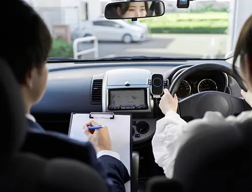 Learner reviewing driving lesson costs in Shepparton