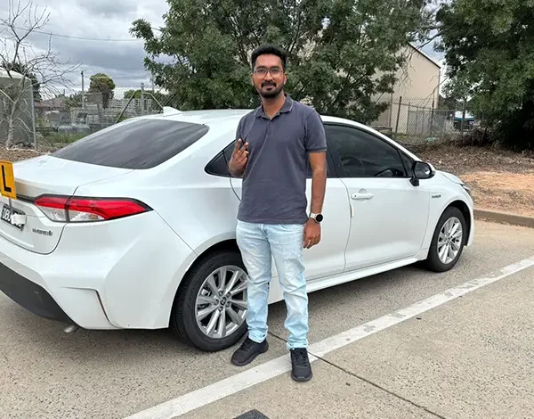 Successful learner celebrating a road test achievement with GV Driving School in Shepparton