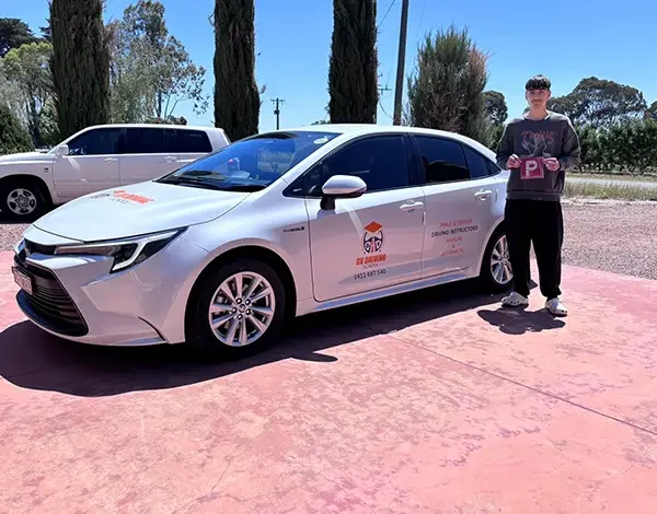 Successful learner celebrating progress with GV Driving School in Shepparton